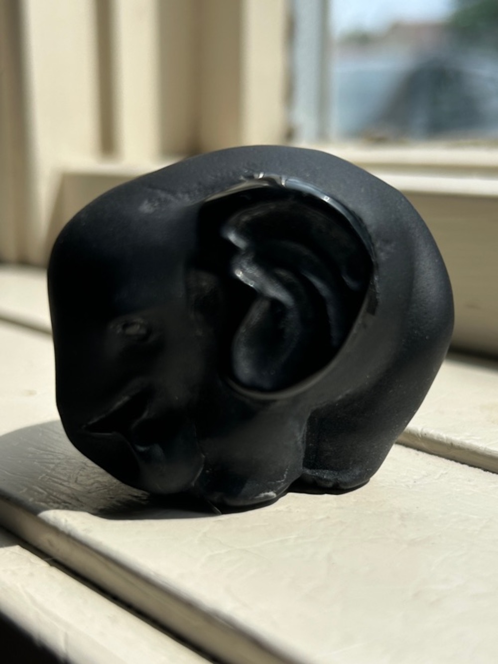 Carved obsidian elephant.